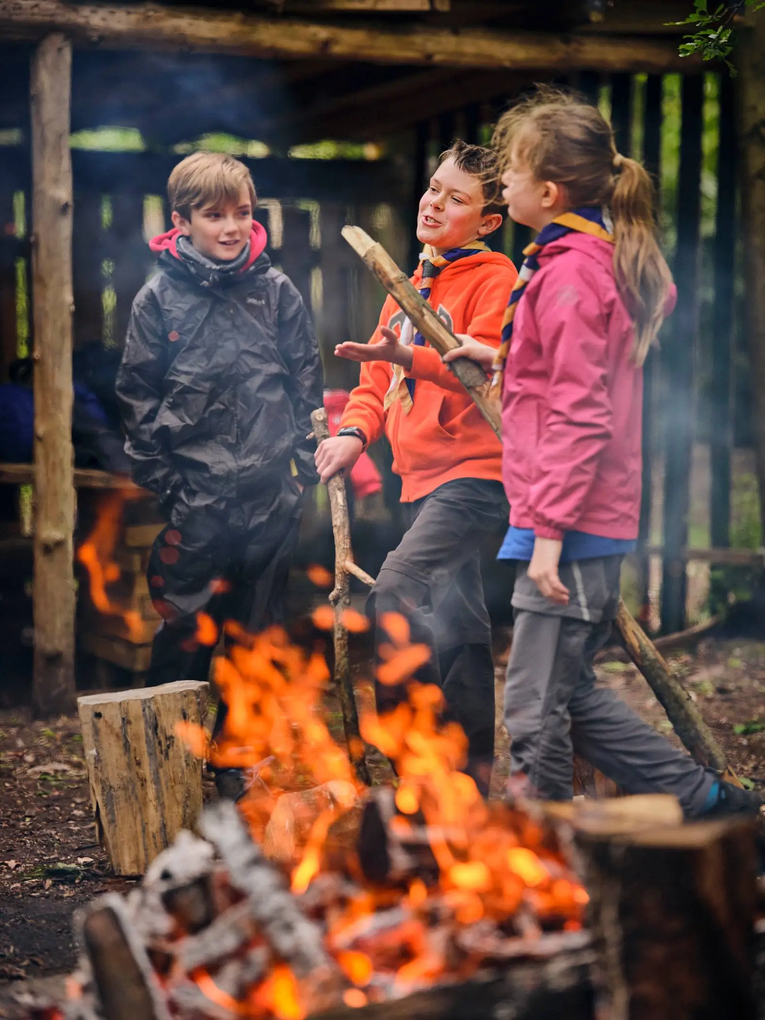 Scouts around a fire Scouts around a fire